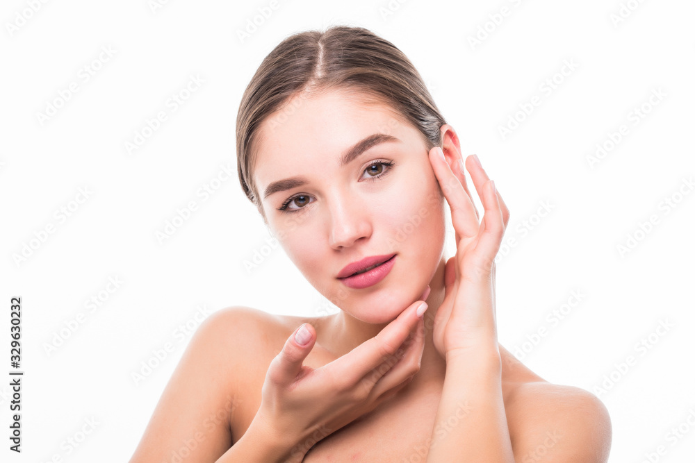 Beautiful spa young woman touching her face isolated on white background.
