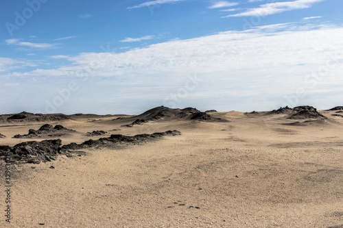 an amazing desert with black dunes