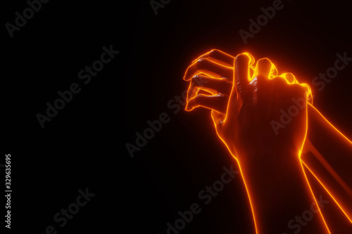 View of grabbing hand with fire glowing. Helping, follow me, don't let go, give me your hand concept. photo