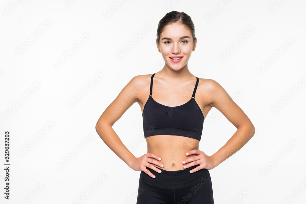 Young sporty muscular woman isolated against white background Young sporty muscular woman isolated against white background