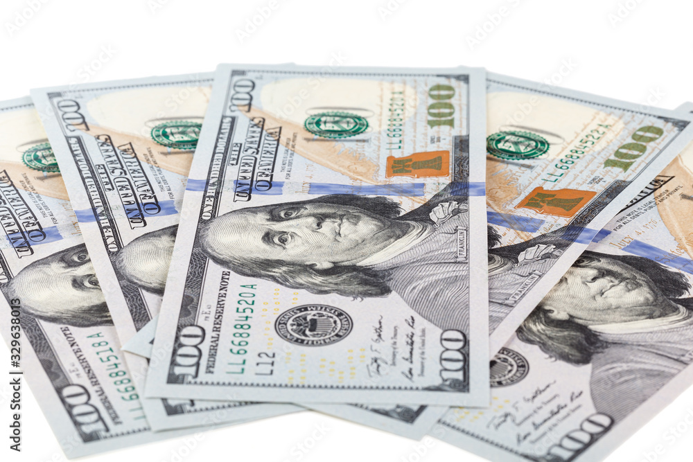 Background of 100 dollar bills. A pile of one hundred US dollars - Banknotes. Cash of hundred dollar bills, dollar background with high resolution Background of 100 dollar bills. A pile of one hundred US dollars - Banknotes. Cash of hundred dollar bills, dollar background with high resolution