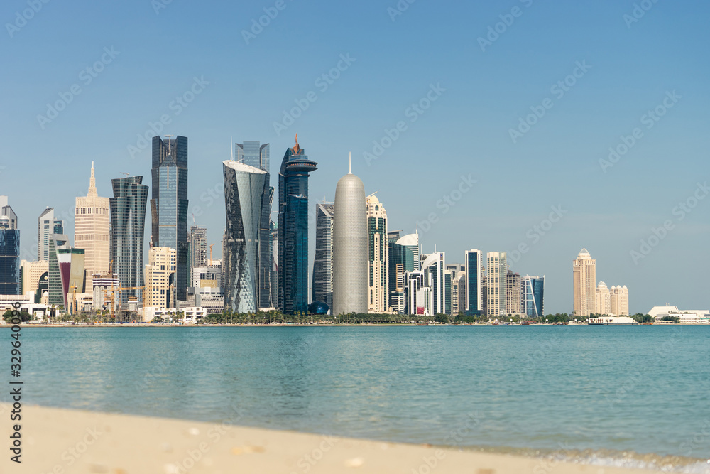 View of city center with skyscrapers from the other side of sea in Doha, Qatar 