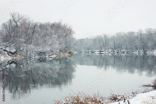 river with frozen forest, winter landscape © Евгений Гончаров