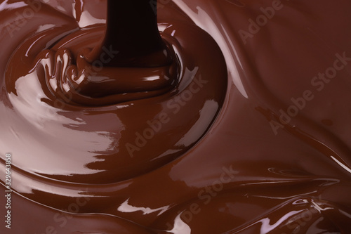 hot melted chocolate background, splash of liquid cocoa