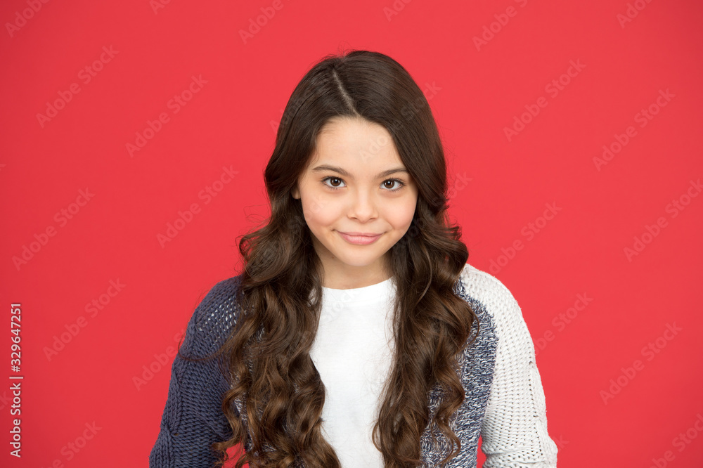 Gorgeous and beauty which you deserve. Little beauty red background. Small girl with long brunette hair. Beauty look of adorable kid. Beauty and hair salon. Haircare and skincare. Be simply beautiful Gorgeous and beauty which you deserve. Little beauty red background. Small girl with long brunette hair. Beauty look of adorable kid. Beauty and hair salon. Haircare and skincare. Be simply beautiful