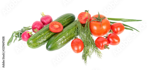 Fresh green cucumbers, different red tomatoes and bundle of green dill leaves isolated on white background. Ingredients for vegetable salad