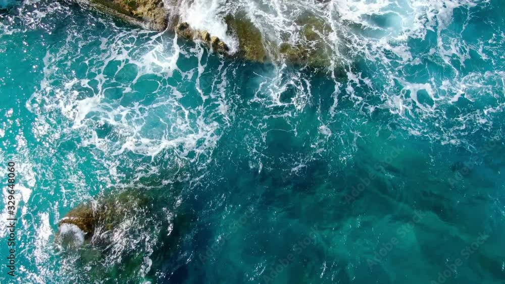 Wild Ocean water from above - Waves hitting the rocks - aerial photography Wild Ocean water from above - Waves hitting the rocks - aerial photography