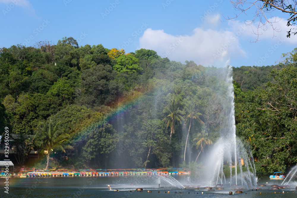 Fototapeta premium Sweet rainbow fountain in park