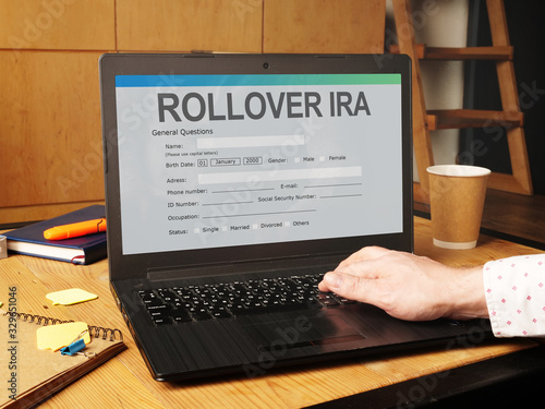 Conceptual hand written text showing rollover ira photo