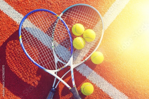 Tennis game. Tennis balls and rackets