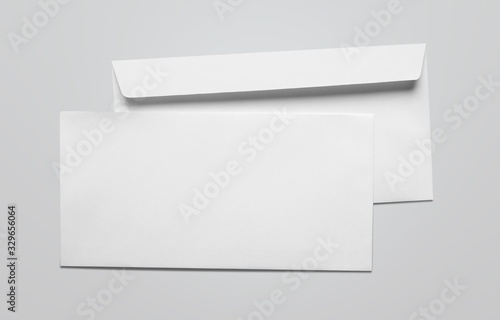 Photography Blank card and white envelope on the desk