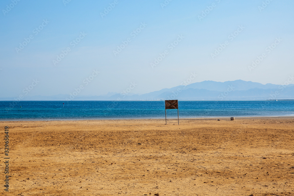 summer photo of beach and blue sea.