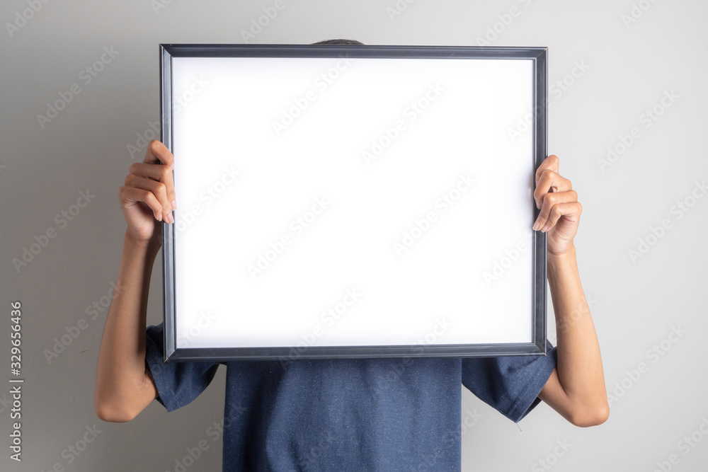 Men holding blank white boards. Your text here mockup design Men holding blank white boards. Your text here mockup design