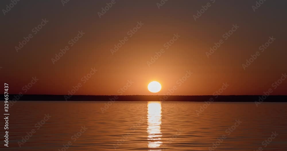 Time lapse, sunset on the horizon above the water. Time lapse, sunset on the horizon above the water.