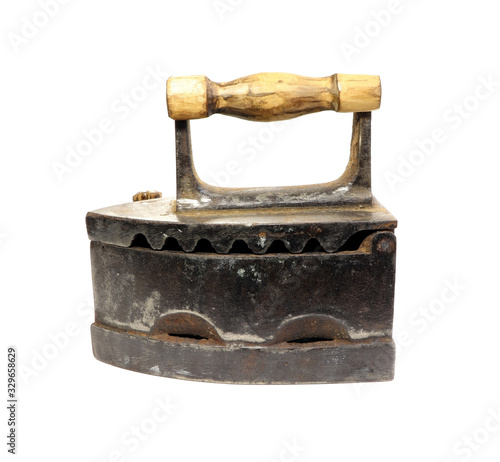 Old iron isolated on a white background. Antique, vintage iron.
