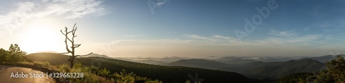 Panorama view of hills in nature with forest in Shenandoah at morning sunny day © AllThings