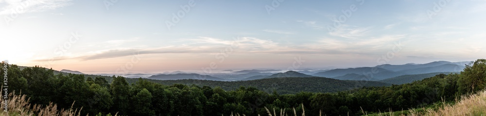 Panorama view of hills in nature with forest in Shenandoah at morning sunny day