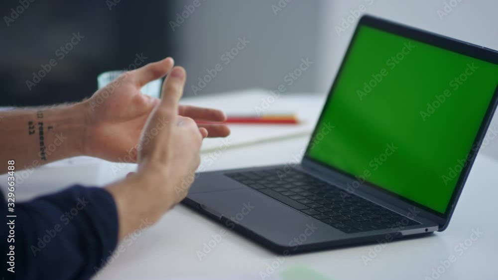 Closeup businessman talking on video conference. Man looking green screen laptop Closeup businessman talking on video conference. Man looking green screen laptop