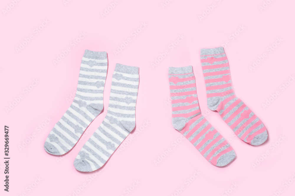Two pairs of Women's socks on a colored background Two pairs of Women's socks on a colored background
