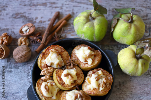 Baked quince with cheese. Healthy food. Vegetarian diet.