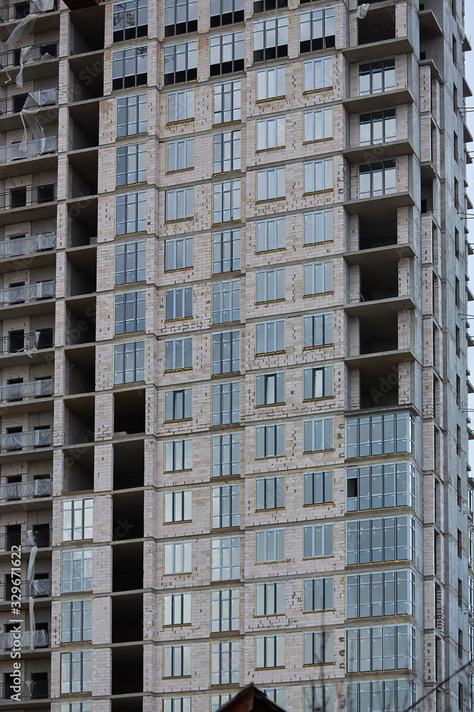 Construction site. High rise Building under construction. Construction of high-rise residential building