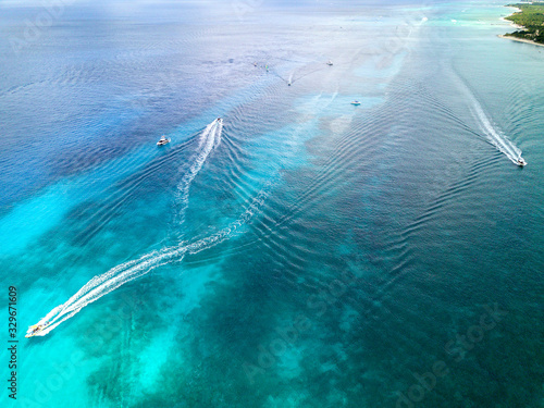Aerial view of Cozumel with boats in the water going to dive at Palancar reef