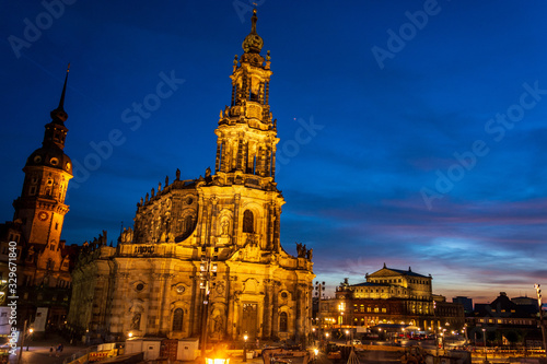 The lit tower Hausmannsturm near the river Elbe in Dresden © Asvolas