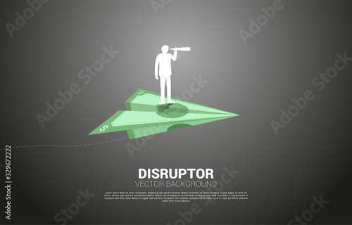 Silhouette of businessman looking through telescope on money banknote origami paper airplane. Business Concept of investor and venture capital.
