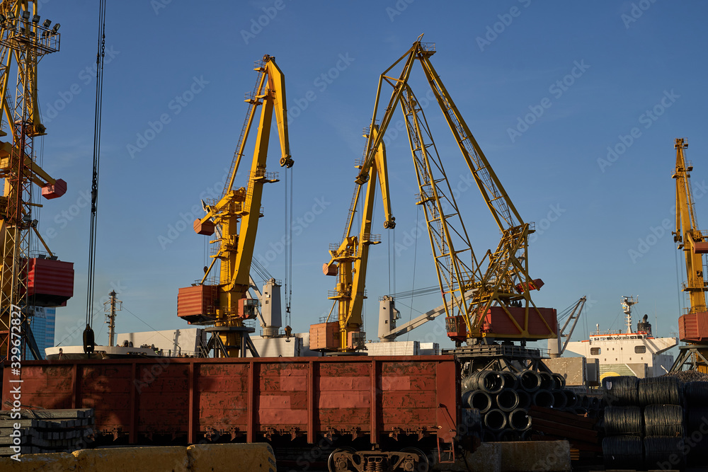 Railway wagon in an industrial port. railway carriage for ore transportation in the commercial sea port