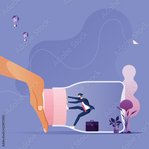 Businessman blocked by big hand in bottle-Business freedom concept