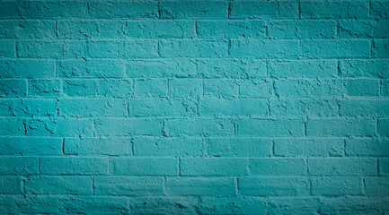 Blue teal brick wall background. Neutral texture of a flat brick wall close-up.