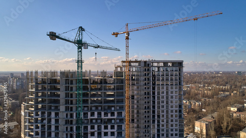 Construction of high-rise residential building. Aerial view of construction of high-rise apartment building.