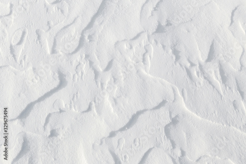 Slika na platnu Fresh snow background - windswept, abstract, sculpted, packed snow