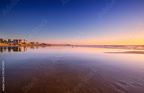 View South on Pacific Beach towards Mission Beach at low tide on a sunny Winter evening