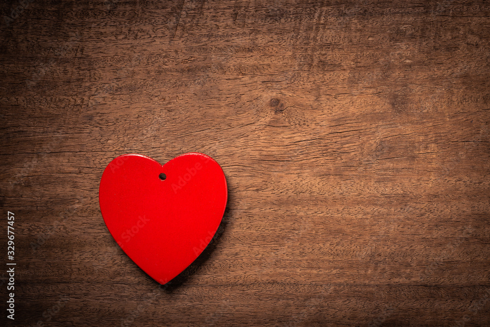Red heart on wooden floor Red heart on wooden floor