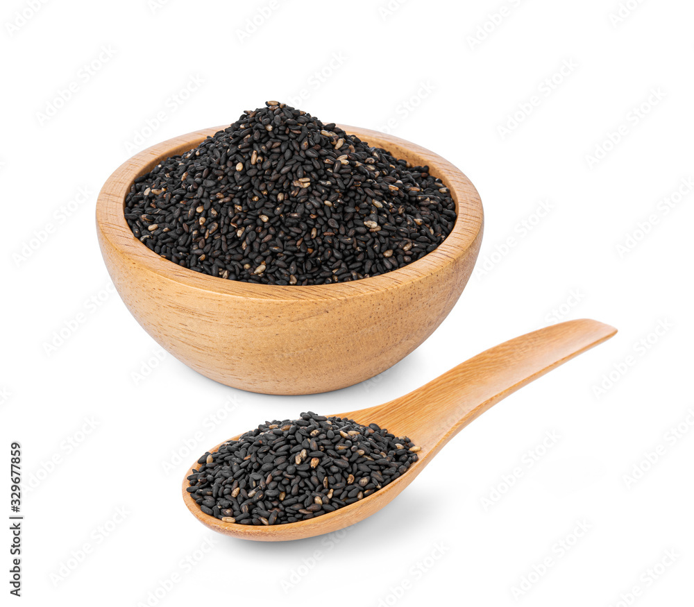 Black sesame seeds in wooden spoon and wooden bowl isolated on white background Black sesame seeds in wooden spoon and wooden bowl isolated on white background