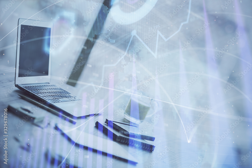 Forex graph hologram on table with computer background. Multi exposure. Concept of financial markets. Forex graph hologram on table with computer background. Multi exposure. Concept of financial markets.