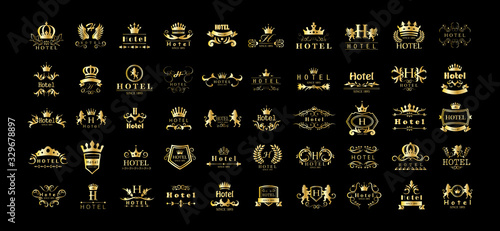 Golden Hotel Luxury Logo Set - Isolated On Black Background, Vector.Icons Collection Of Golden Hotel Logo, Emblem And Label.Useful For Badge,Seal And Design Template.Vector Illustration Of Luxury Logo photo