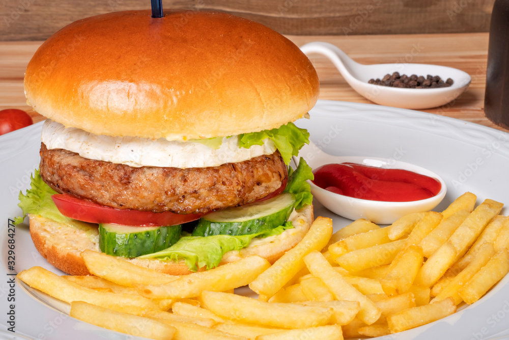 Beef burger with a white bun Beef burger with a white bun