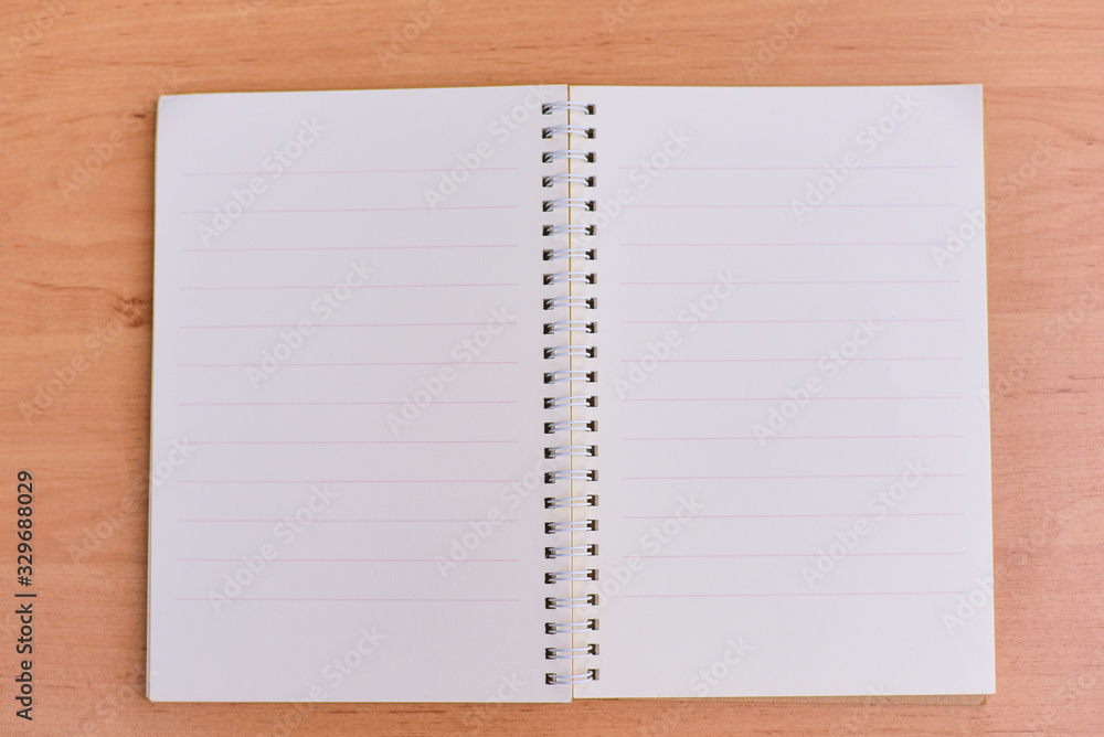 Close Up Notebook for your text on table in the living room. Close Up Notebook for your text on table in the living room.