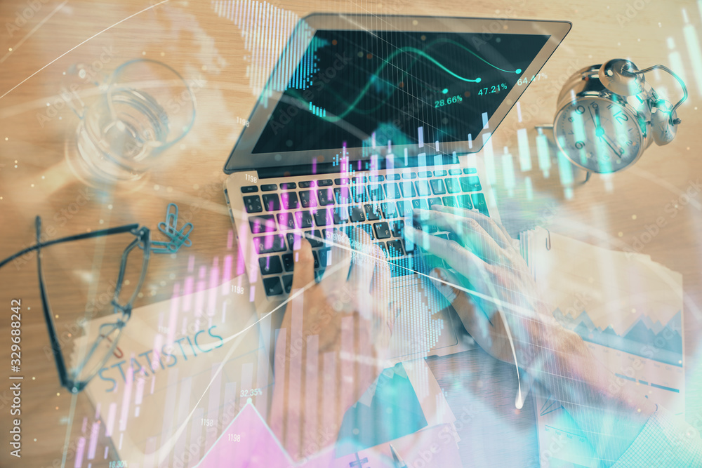 Multi exposure of forex graph with man working on computer on background. Concept of market analysis. Multi exposure of forex graph with man working on computer on background. Concept of market analysis.