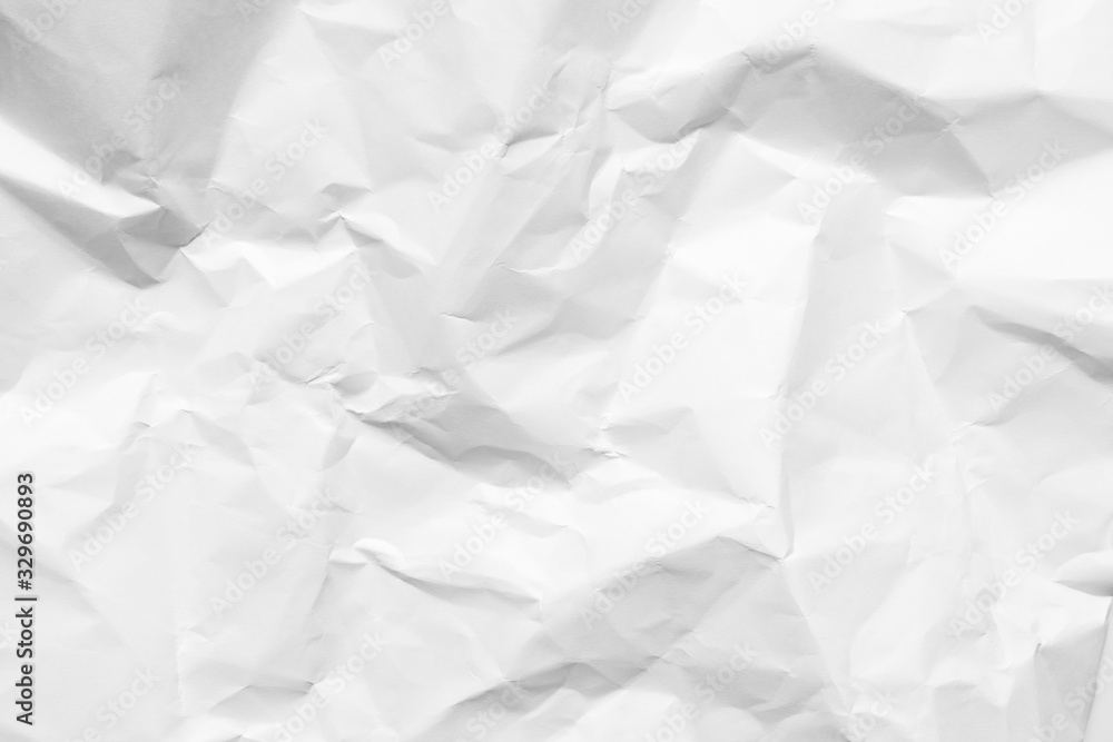 White crumpled paper texture background. Clean white paper. Top view. White crumpled paper texture background. Clean white paper. Top view.