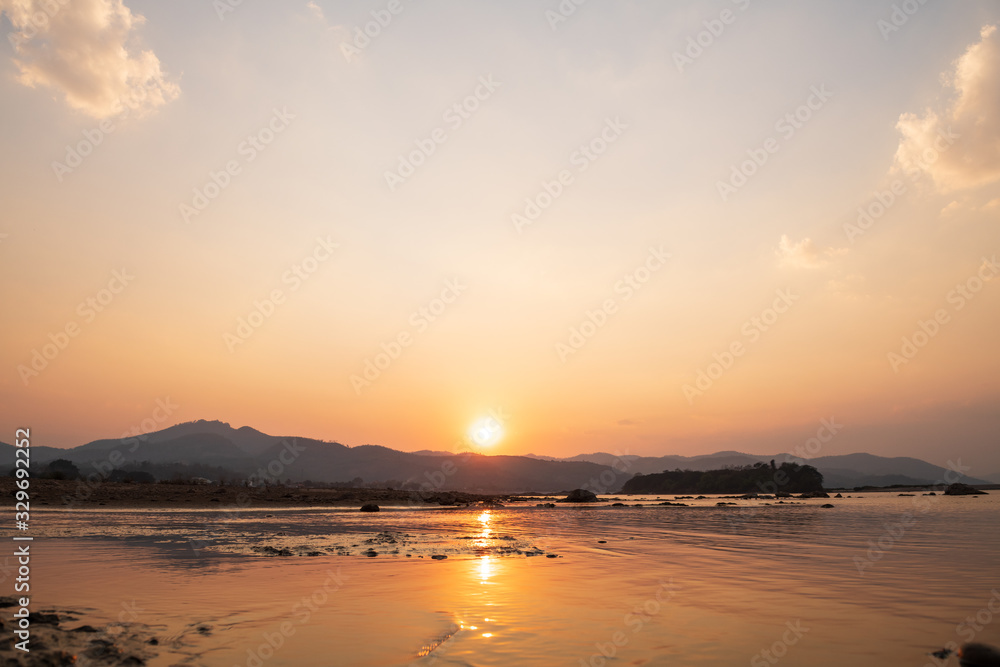 Sunset landscape of the Mekong river at Pakchom district in the northeastern Thai province of Loei.