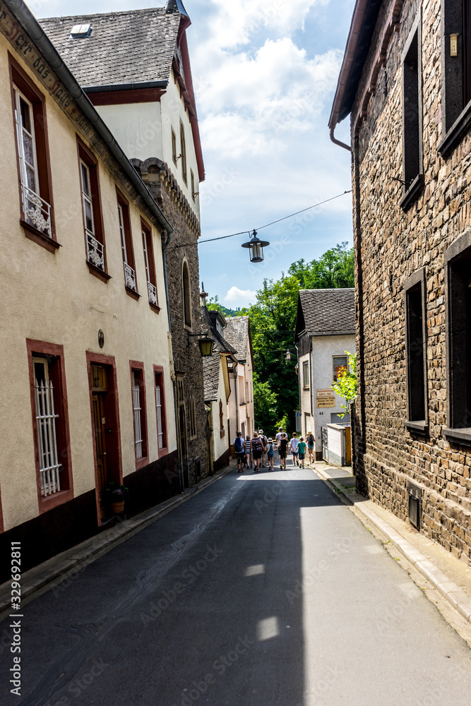 Germany, Moselkern Forest, a narrow street in front of a brick building