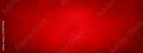 red paper background in Christmas colors with old vintage texture in rich ele...