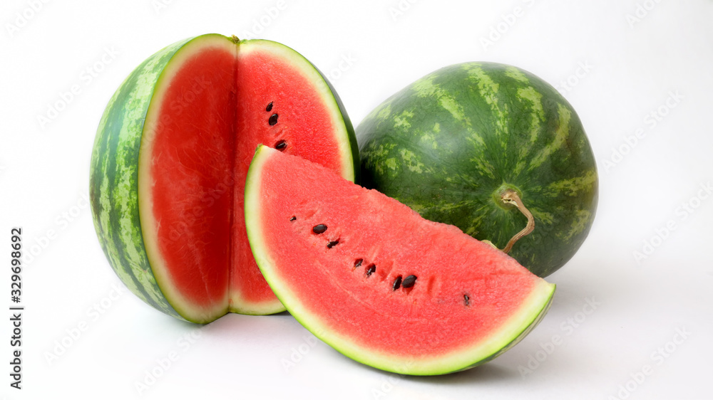 Close up view of whole and sliced ripe watermelon isolated on white background Close up view of whole and sliced ripe watermelon isolated on white background