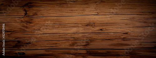 Photos Dark stained reclaimed wood surface with aged boards lined up