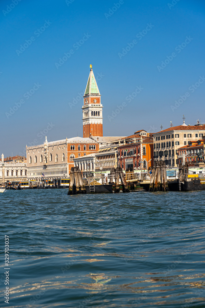 Campanile and Venice Doge's palace on San Marco square on beautiful day