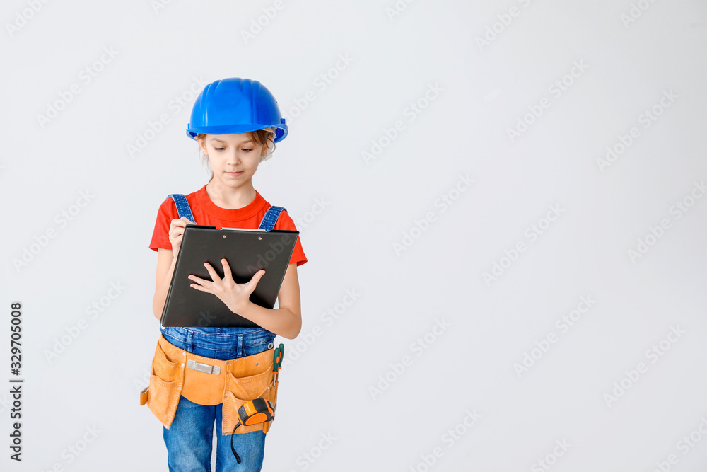 Cute little architect on light background Cute little architect on light background