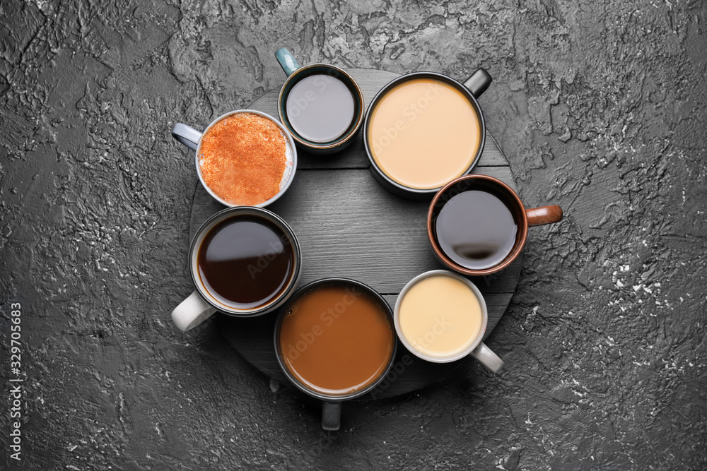 Composition with cups of different coffee on grunge background - obrazy, fototapety, plakaty 